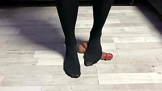 Sexy Dominatrix in Nylon Pantyhose Is Trampling Your Cock