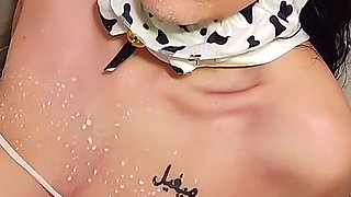 Cow with Big Udders Pissing and Being Pissed on by Shepherd