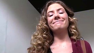 Brunette woman gets a big black cock at a glory hole