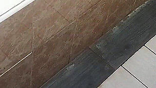 A Brunette Gets Pissed on