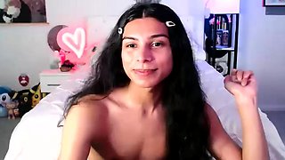 Small titted brunette Sharron with glasses masturbates