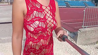 Lace sundress flaunts big tits and pussy in the wild