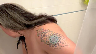 Hot Big Titted Mom taking a shower and washing her hair.