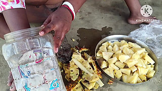 Desi Bhabhi Looks Very Hot While Cutting Fruits