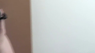 Busty Redhead in Glasses Films Herself Naked in the Bathroom Mirror