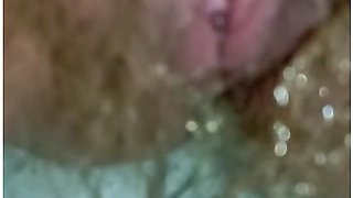 Detailed Close-up Footage Of A Hairy Pussy Girl Urinating From Her Pee Hole And Farting Loudly