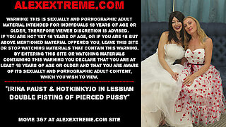Irina Faust & Hotkinkyjo in lesbian double fisting of pierced pussy