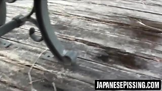 Sensual Japanese babe peeing while talking on phone