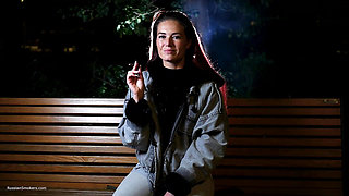 Sexy Russian Beauty Smoking Cigarette by Seaside