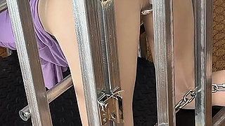 Iron Cages Hang From the Popcorn Shell