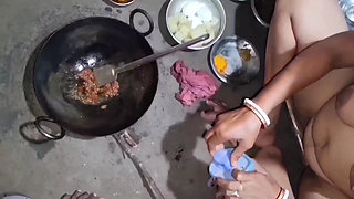 I was cooking naked when my husband came over and started squeezing my breasts.