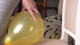 Sexy Girl Pops Balloons in Ripped Pants